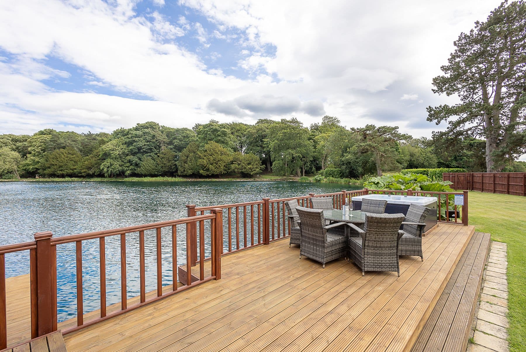 Hot tub on the deck overlooking the lake